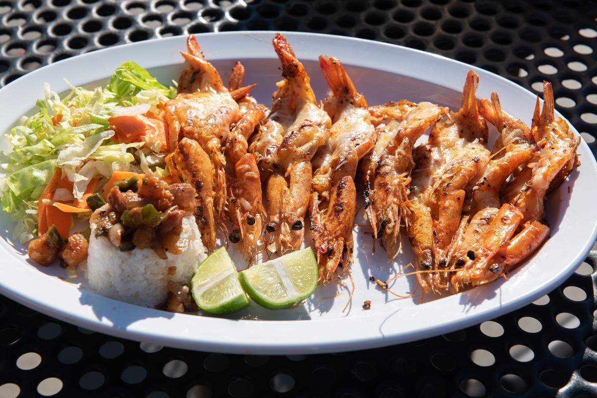 Shimp Zarandeados from Mariscos Algo Bien food truck at La Placita food truck park on 9th Street in Modesto, Calif., Tuesday, Dec. 13, 2022.
