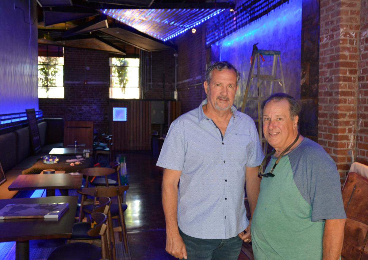 Reata owner John Maddox (left) and Redwood Cafe owner Bob Campana inside what will become a second Redwood Cafe location in Oakdale, Calif. on May 27, 2021.
