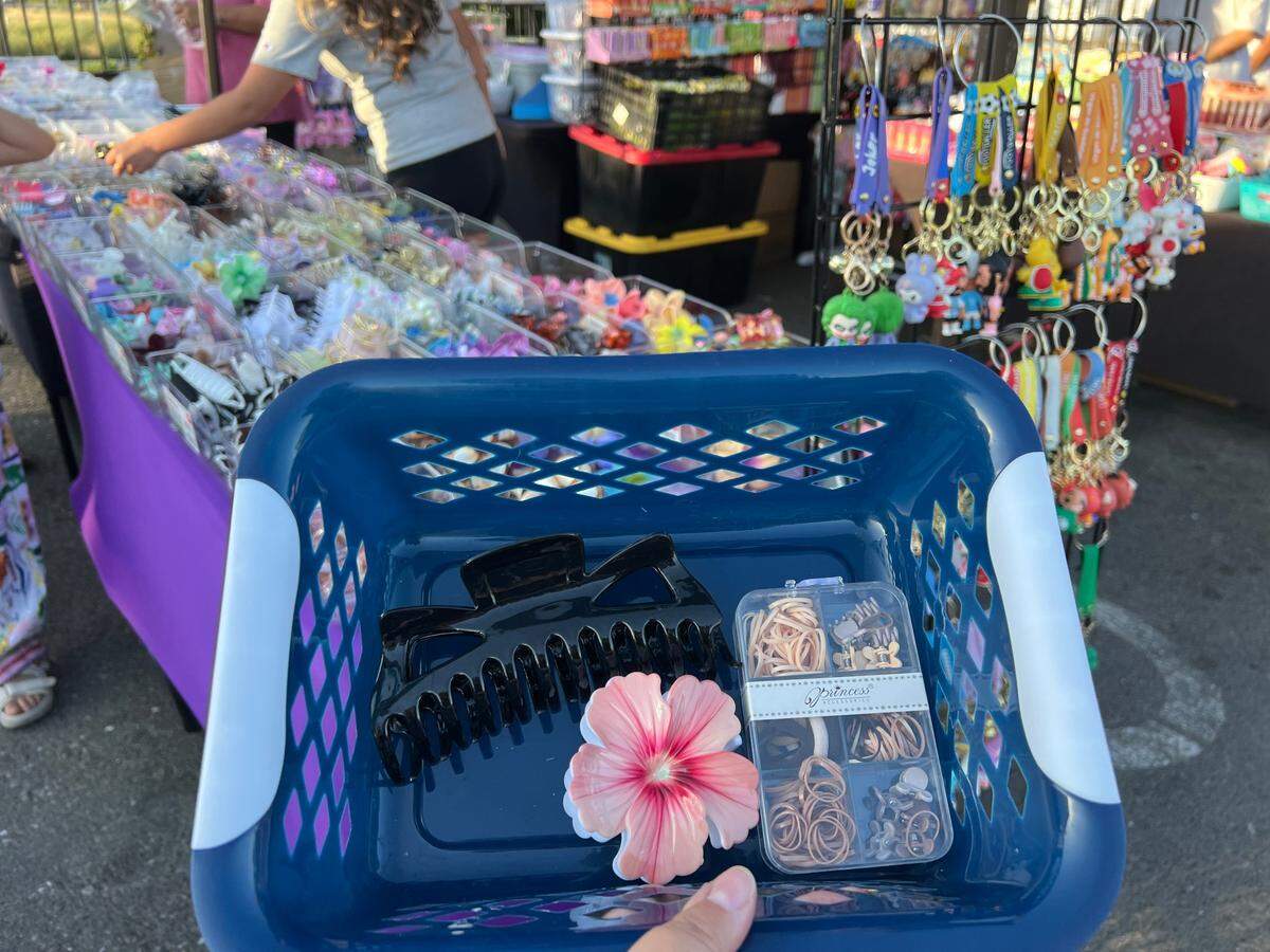 A booth selling hair accessories for $1 apiece at the flea market.