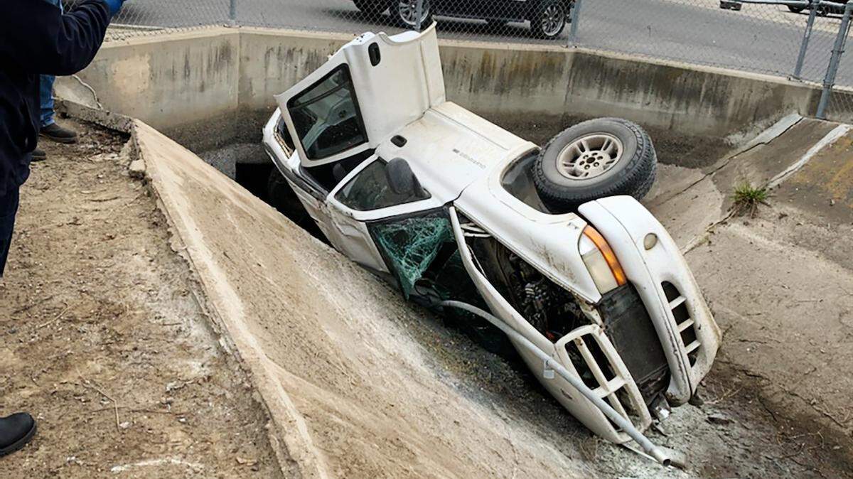City workers Jeremy Camacho and Justin Hiti came to the aid of the driver and his two passengers after their vehicle crashed into this canal at Hatch Road and Boulder Avenue on Feb. 19, 2021, in south Modesto.