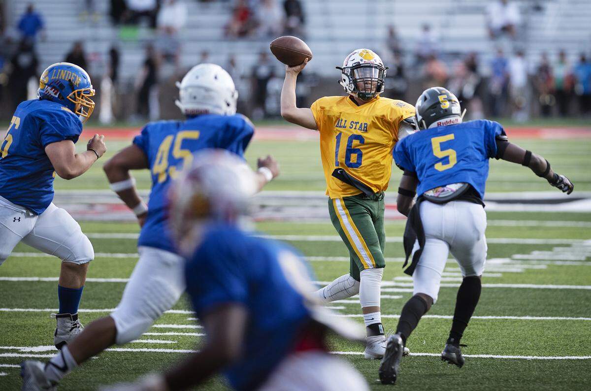 South’s Xavier Rodriguez (Grace Davis) throws a pass during the Central California Lions All-Star Football game at Lincoln High School in Stockton, Calif., Saturday, June 15, 2019.