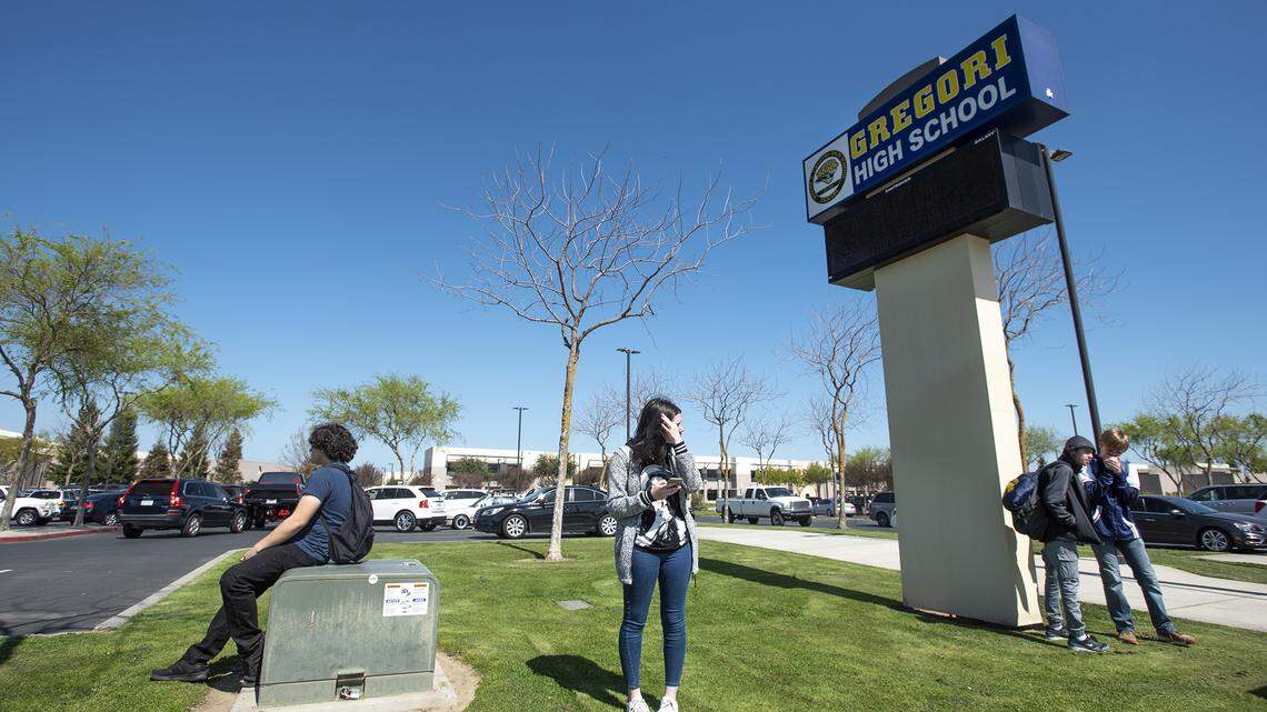 Gregori High School students leave school after the end of classes in Salida, Calif., on Friday, March. 13, 2020.