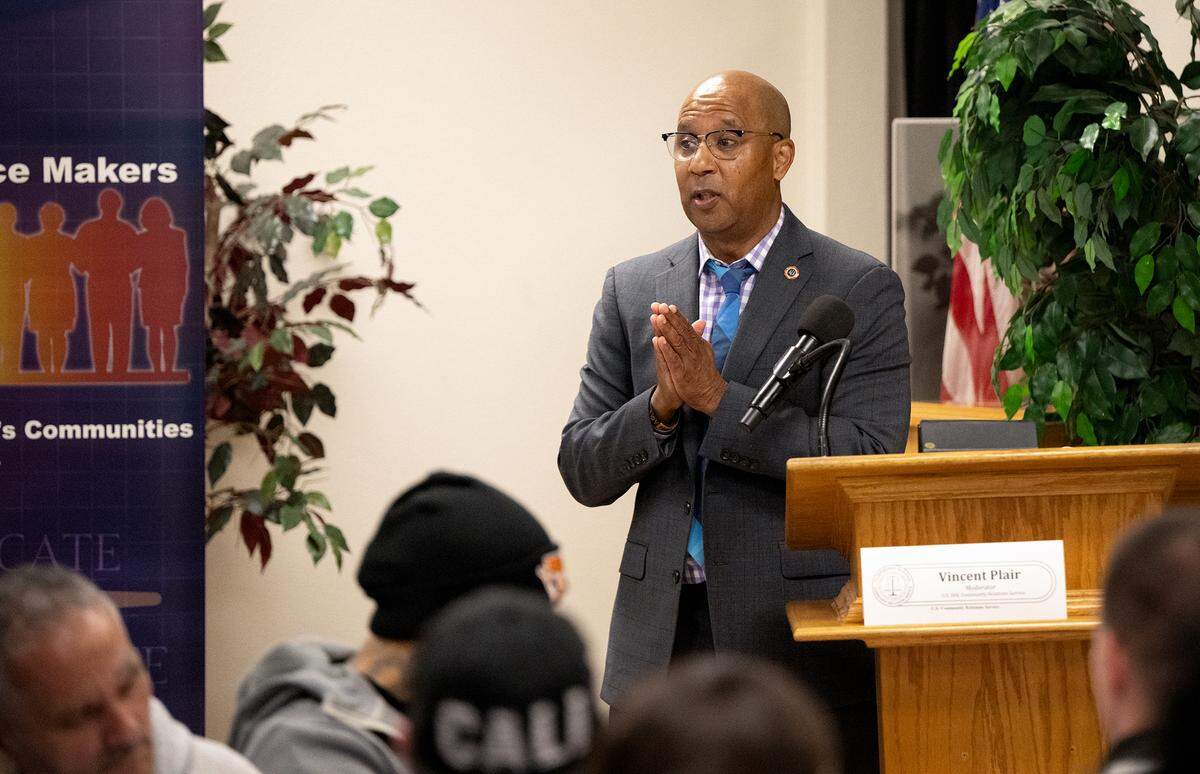 Vincent Plair with the U.S. Department of Justice Community Engagement Service moderates a NAACP panel on law enforcement at the King-Kennedy Center in Modesto on Tuesday, Feb. 18, 2025.