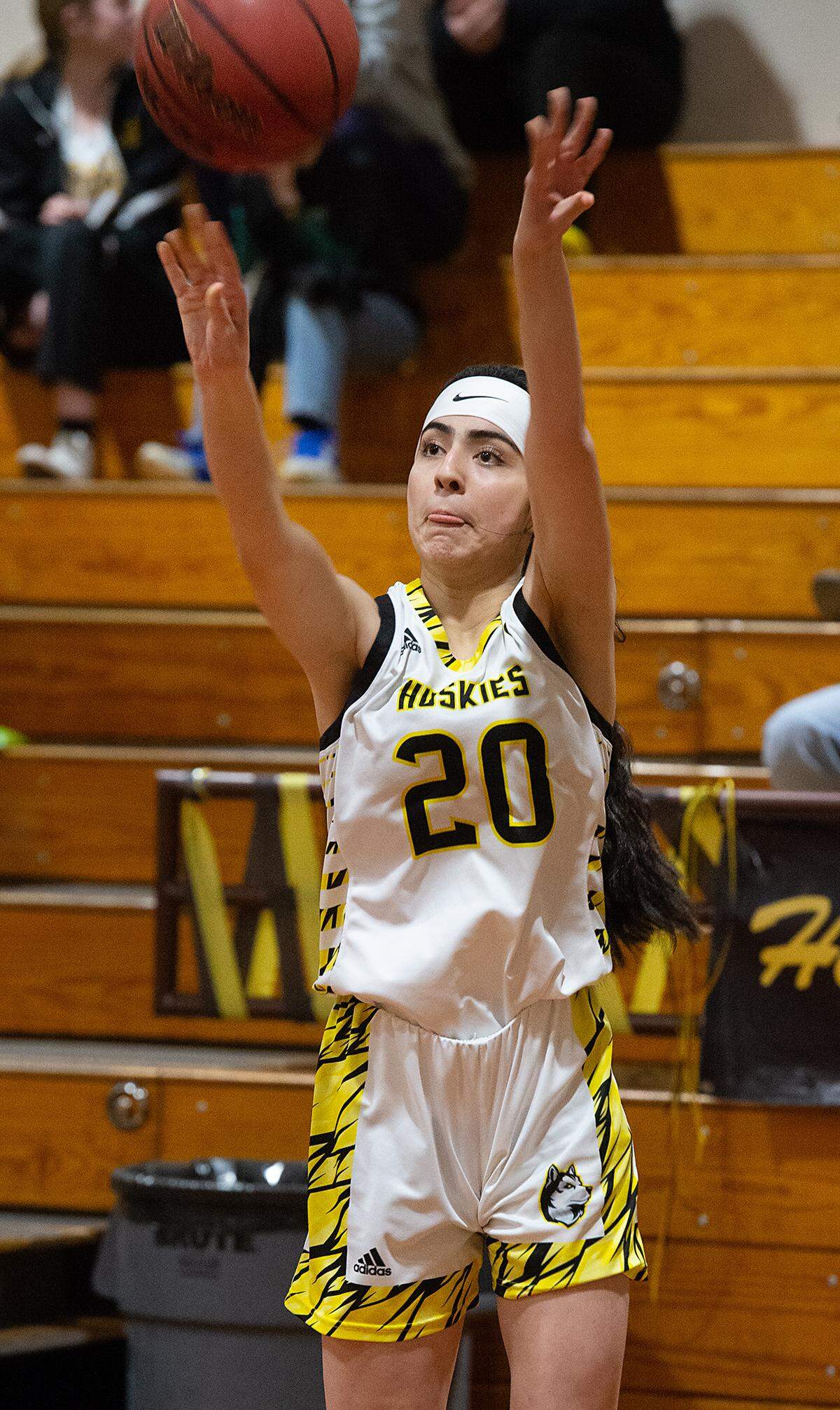 Hughson’s Yuliana Rocha drains a three-point basket during the Trans-Valley League game with Riverbank in Hughson, Calif., Tuesday, Jan. 31, 2023.