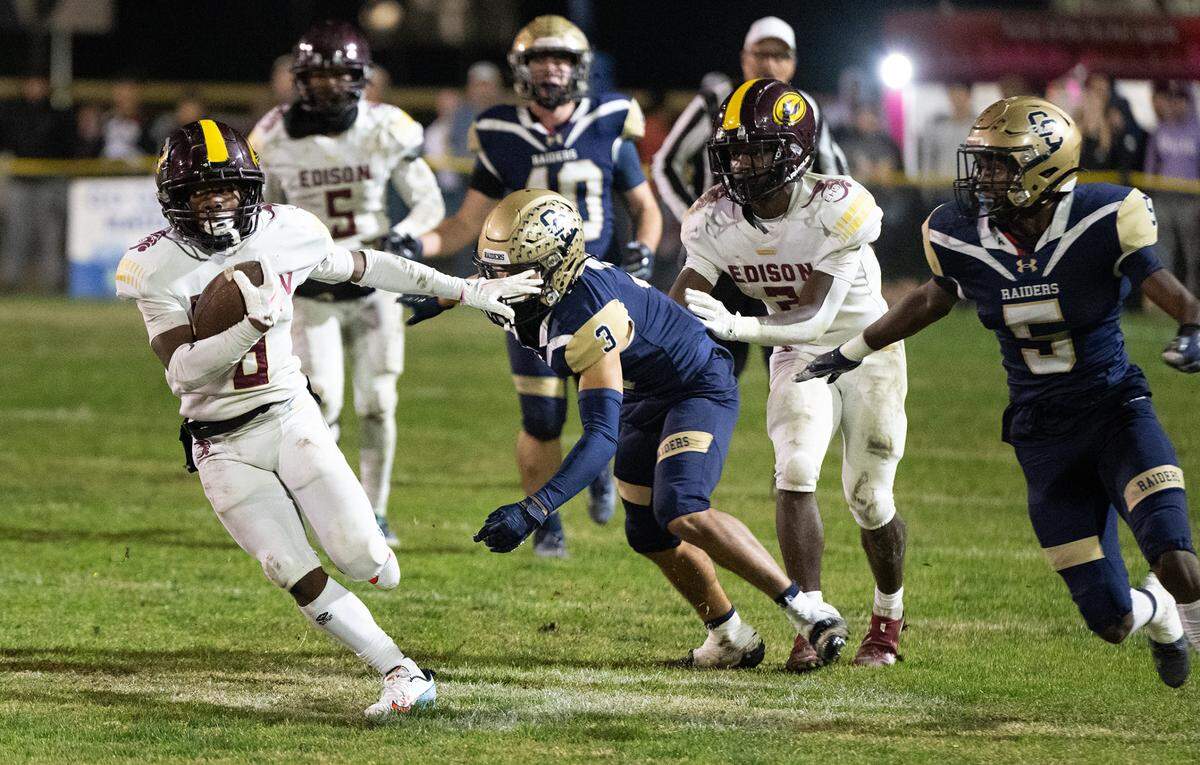 Edison’s Kiaza Calhoun runs after a catch during the Sac-Joaquin Section Division I quarterfinal game with Central Catholic at Central Catholic High School in Modesto, Calif., Friday, Nov. 10, 2023.