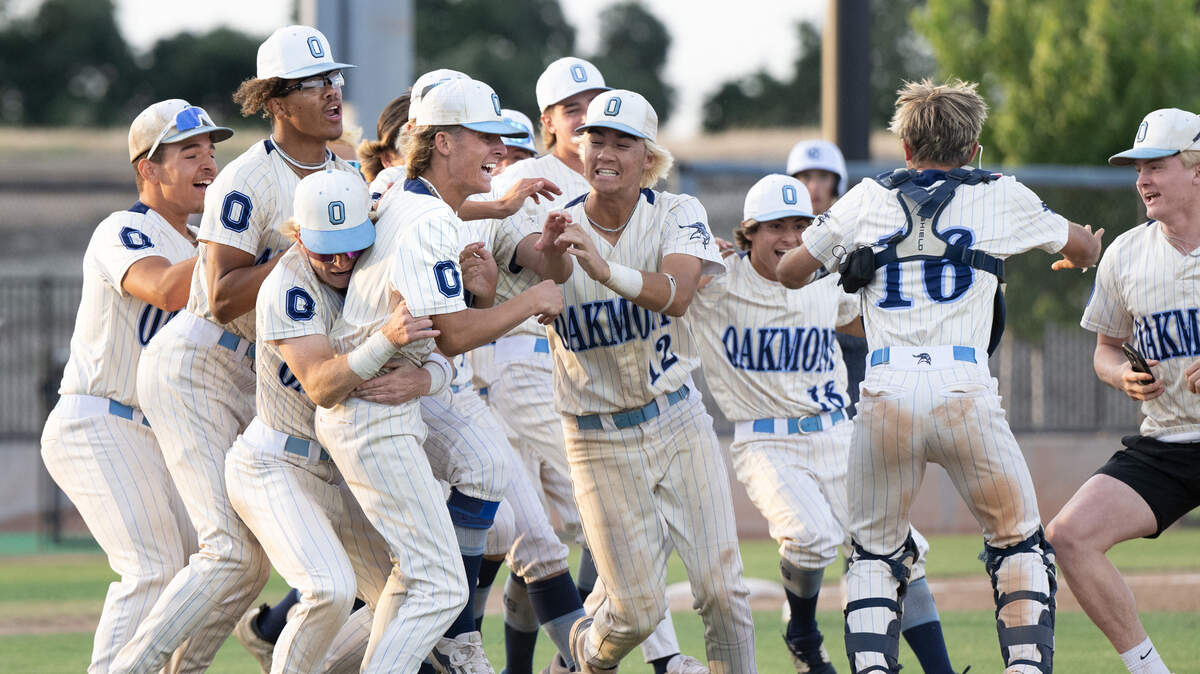 Oakmont players celebrate winning the CIF Sac-Joaquin Section Division III championship game over Central Catholic at Islanders Park in Lathrop on Thursday.