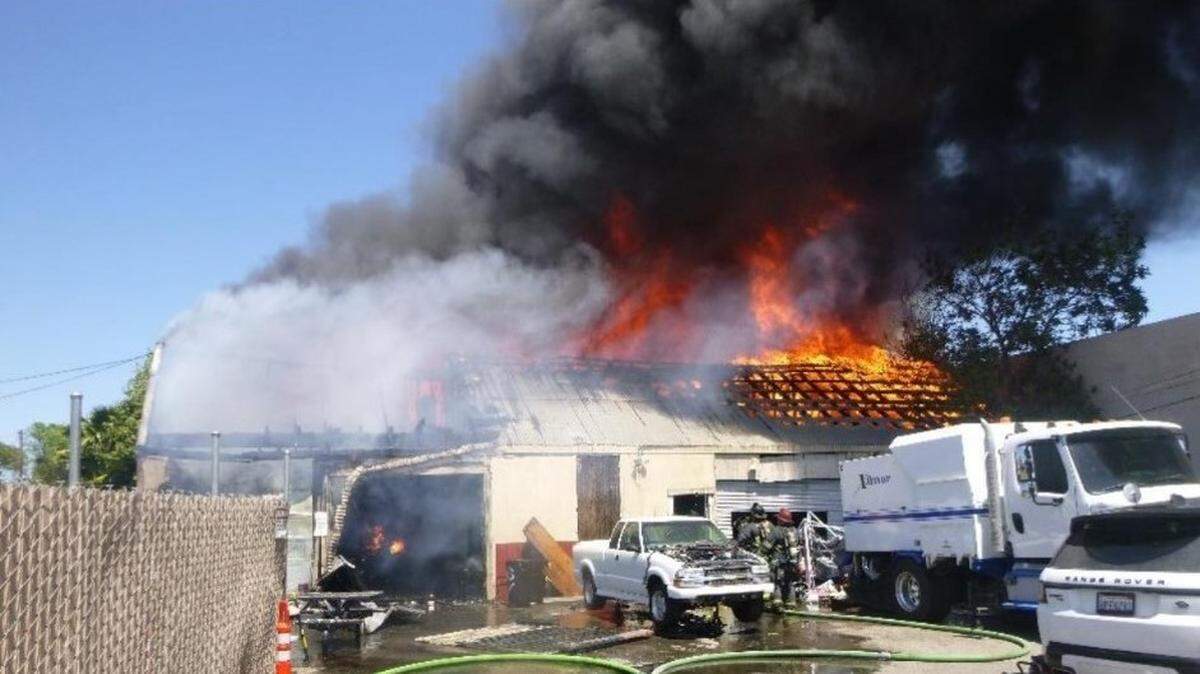 A commercial building at North Ninth Street and Clayton Avenue in Modesto was damaged by fire Sunday afternoon, April 13, 2025.