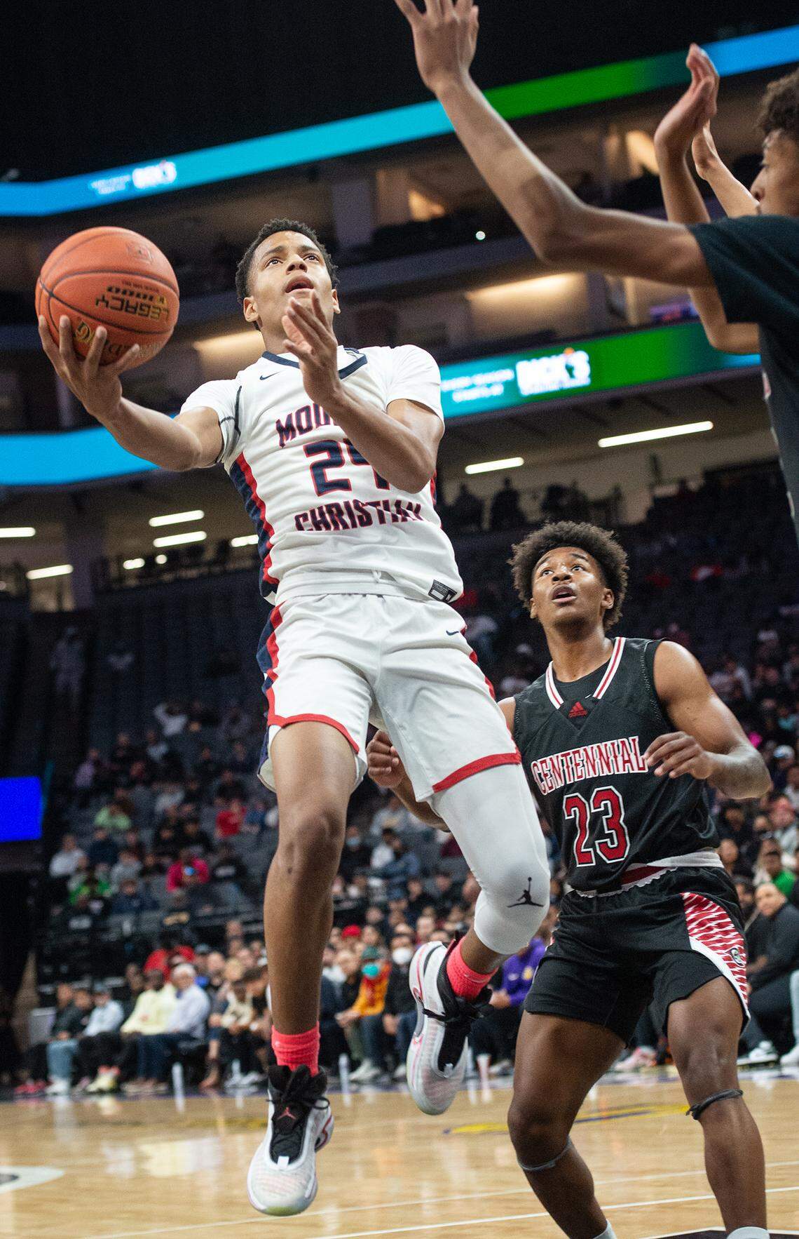 Modesto Christian’s Jamari Phillips scores during the boys Open Division CIF State Basketball Championship game with Centennial at Golden 1 Center in Sacramento, Calif., on Saturday, March 12, 2022. Centennial won the game 59-50.