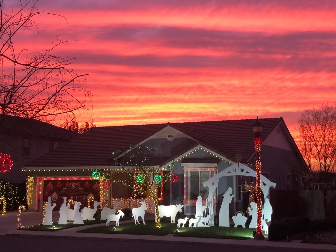 Several homes on Mariposa Drive in Hughson decorate for the Christmas season.