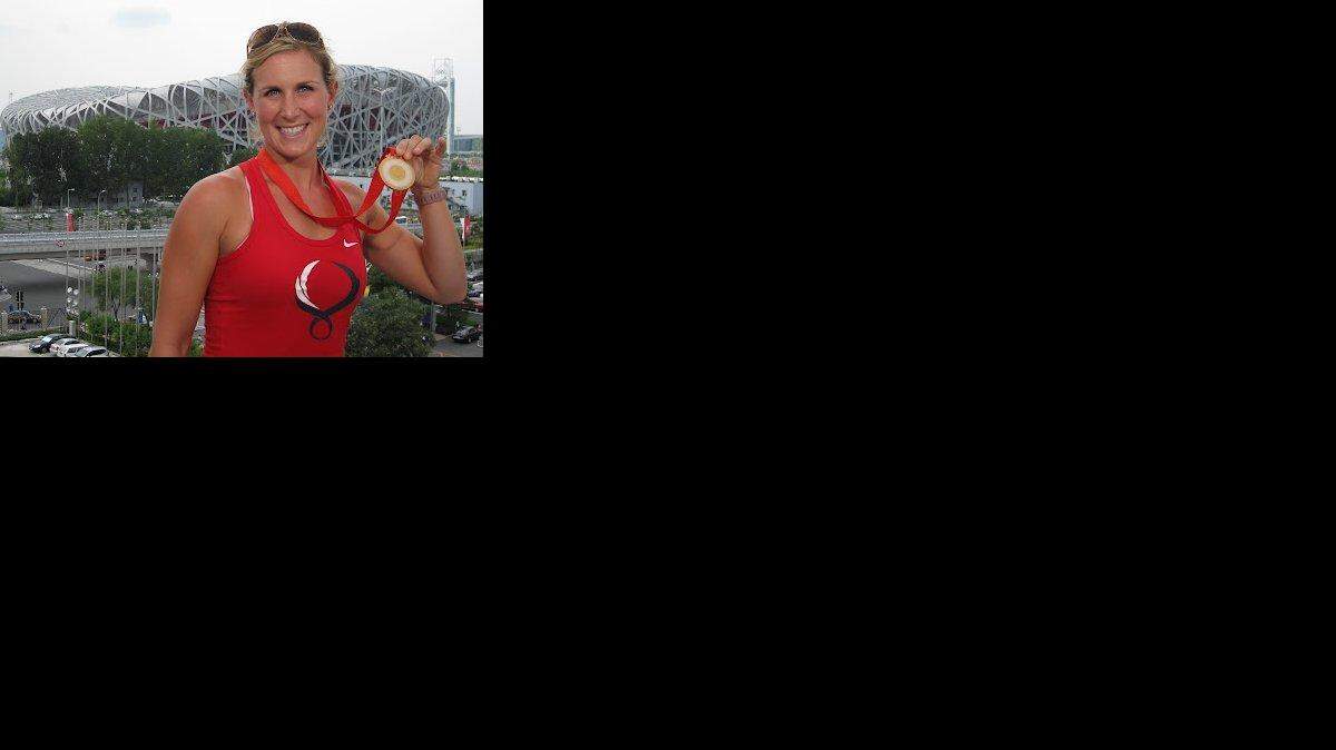 Modesto’s Erin Cafaro with her gold medal in women’s eight rowing in Beijing, 2008.