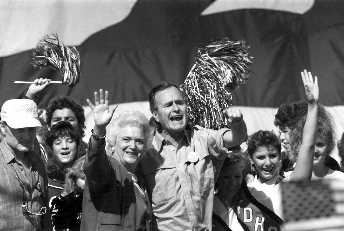 George and Barbara Bush are happy to be in Modesto, Calif. on October 15, 1988.