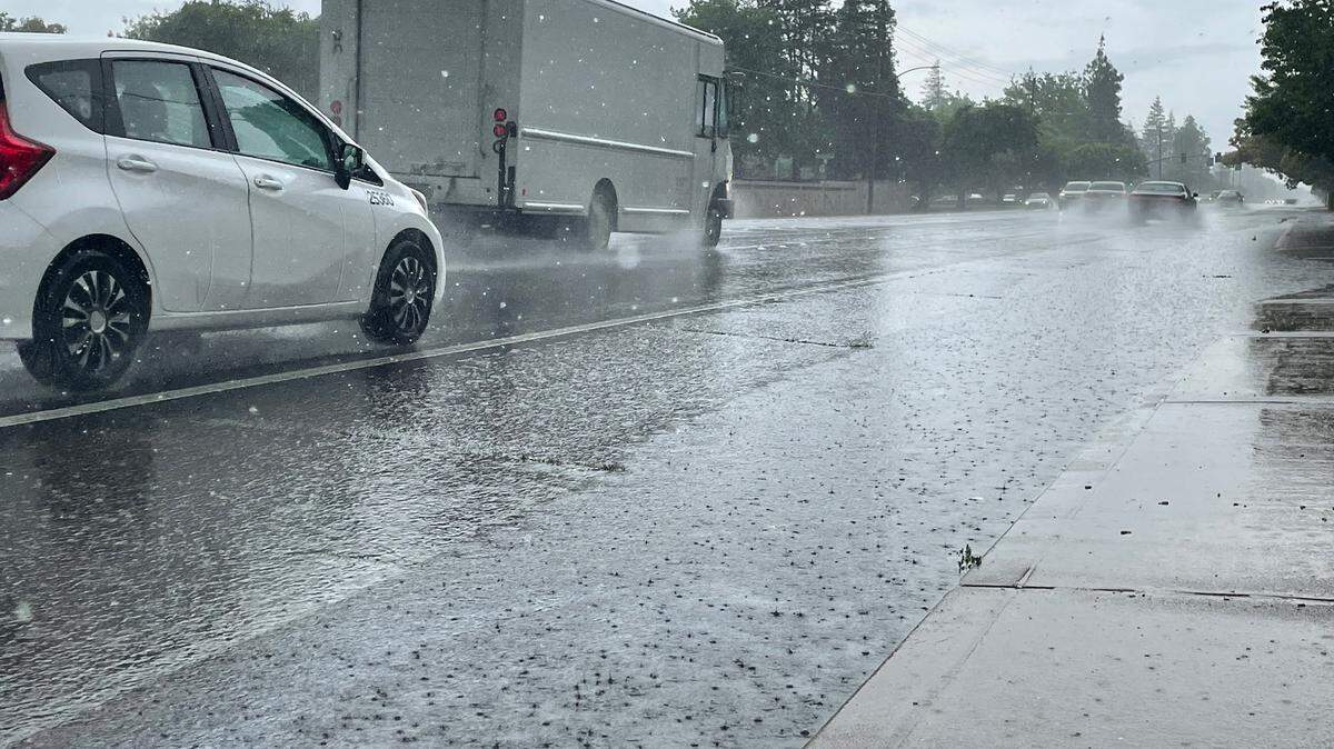 Heavy rain comes down on Sylvan Avenue in Modesto, Calif., on Thursday, April 21, 2022.