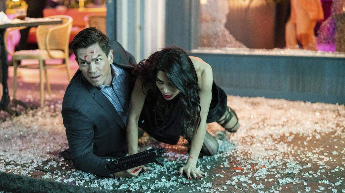 Steve Howey, left, and Ginger Gonzaga in the CBS series “True Lies.”