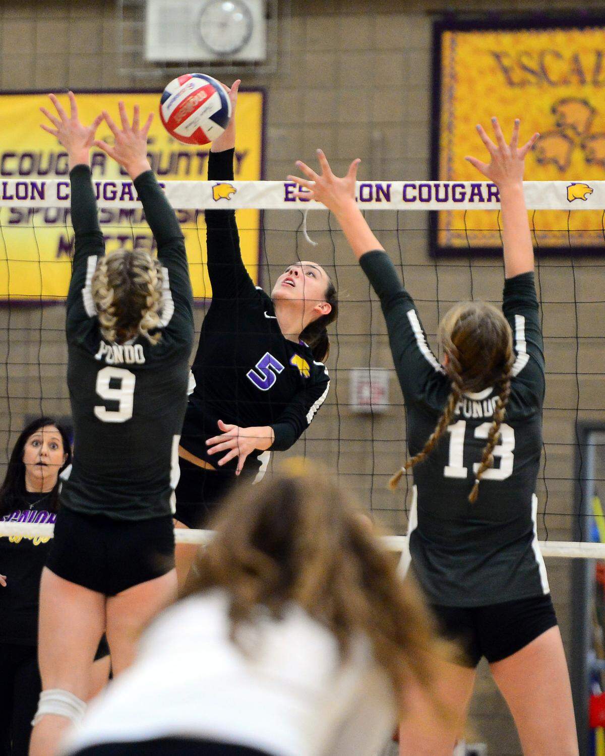 Escalon’s Emily Vickers (5) spikes the ball during a CIF San-Joaquin Division III Girls Volleyball Playoffs game between Escalon High School and Ponderosa High School at Escalon High School in Escalon CA on November 1, 2022. Escalon won the match 3-2.