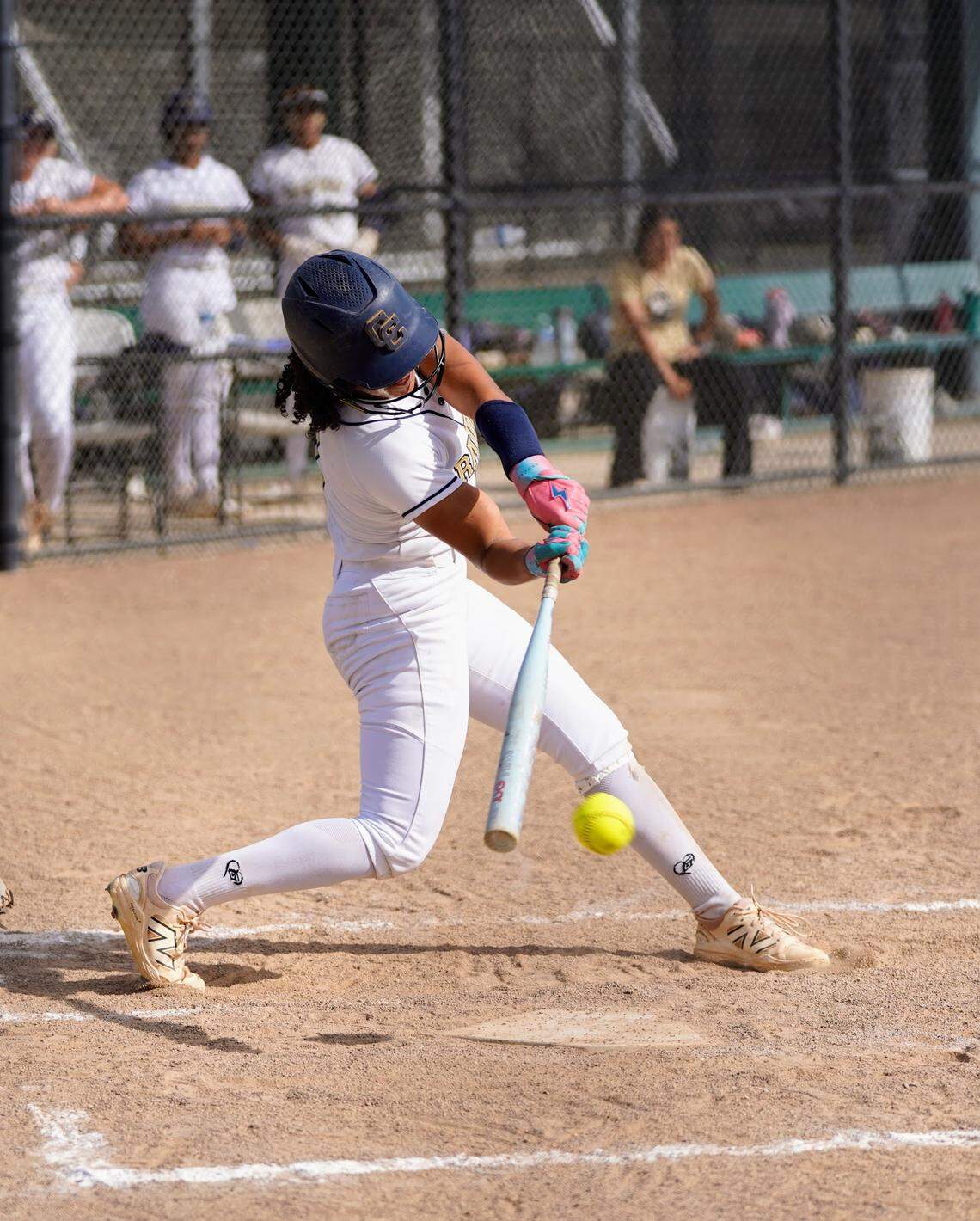 Central Catholic’s Jazmarie Roberts makes contact with a pitch during a Valley Oak League game against Manteca at Manteca High School on Tuesday, April 22, 2025.