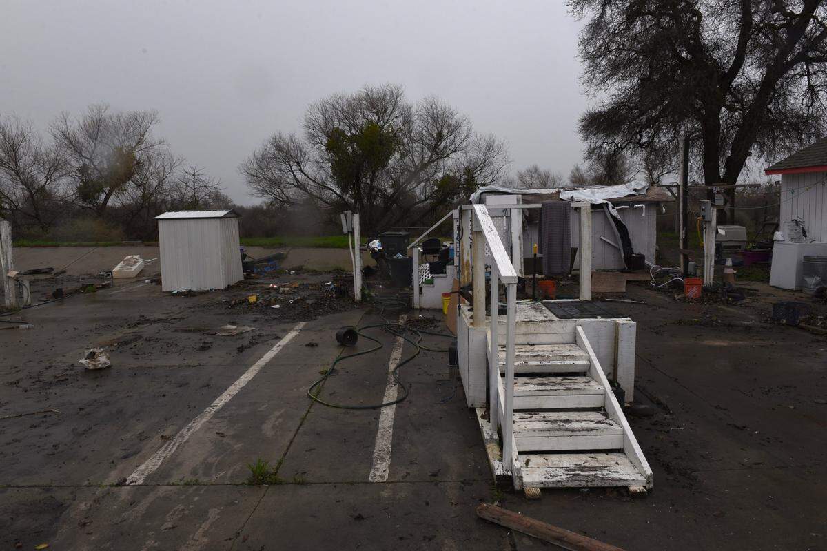 The Catfish Camp mobile home park along the San Joaquin River at Crows Landing Road is pictured Wednesday, Jan. 11, 2023. Residents are under an evacuation order.