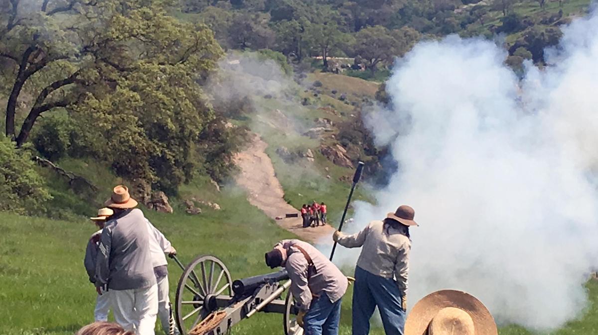 Confederate soldiers fire a cannon during a Civil War re-enactment Saturday in Knights Ferry March 23, 2019.