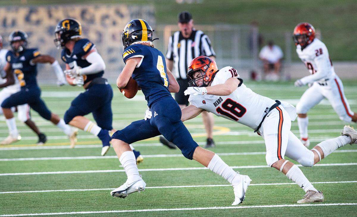Merced’s Jack Collins tracks down Gregori quarterback Grant Veneman during the non-league game at Gregori High School in Salida, Calif., on Friday, August 26, 2022.