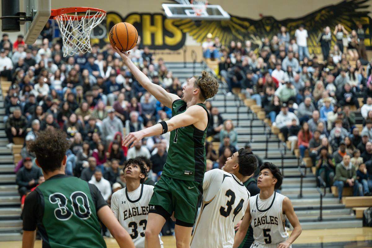 Pitman’s Avery Sanchez scores on a fourth quarter layup during the Central California Athletic League game with Enochs at Enochs High School in Modesto, Friday, Jan. 24, 2025.
