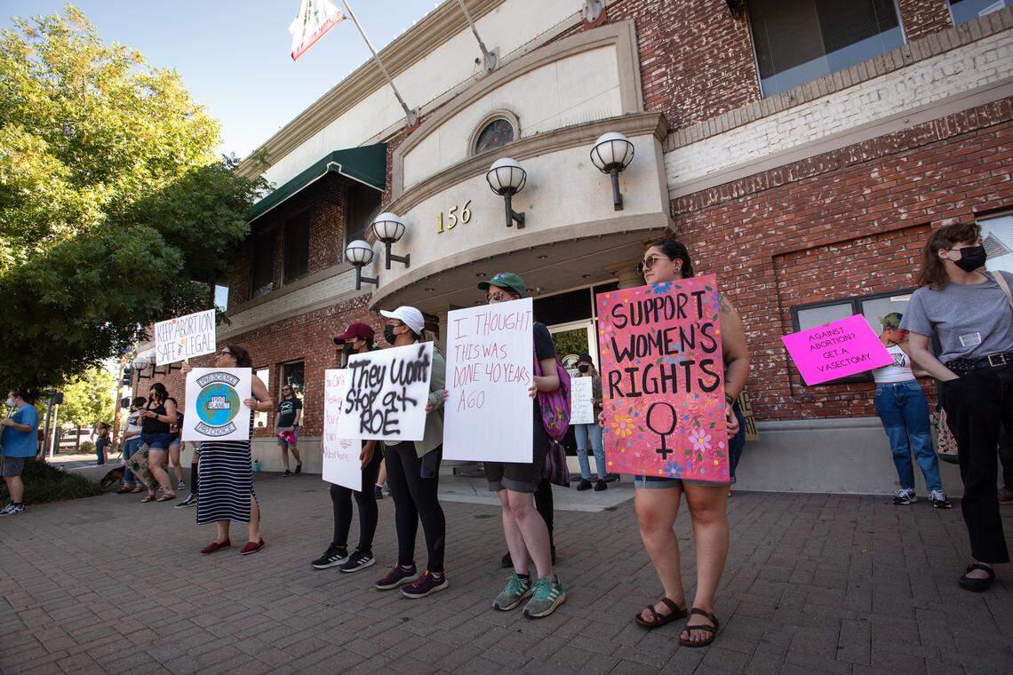 Abortion rights advocates rally outside Turlock City Hall in Turlock, Calif., on Tuesday, June, 28, 2022.