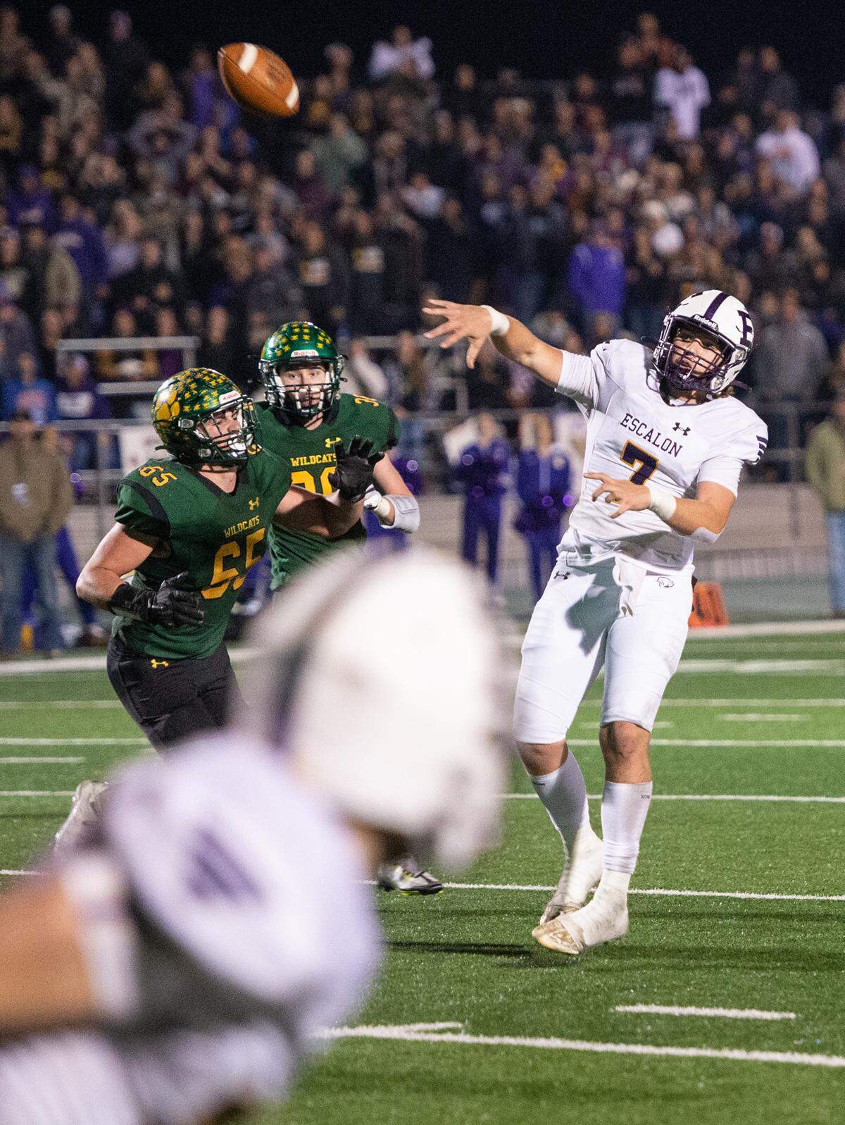 Escalon’s Donovan Rozevink launches a pass into the end zone for teammate Owen Nash during the Sac-Joaquin Section Division V championship game with Sonora at St. Mary’s High School in Stockton, Calif., Saturday, Nov. 26, 2022.