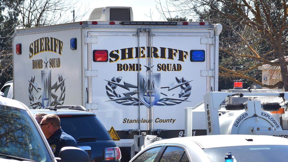 Members of the Stanislaus County Sheriff's Bomb Squad on Tuesday March 6, 2017, remove an inert mortar found inside a home in the 1000 block of Carrousel Court in Turlock, California.