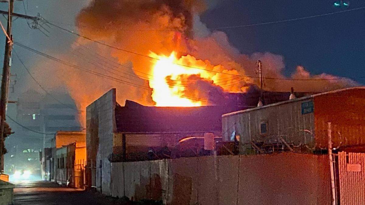 Fire destroyed a small apartment atop a commercial building on the 600 block of 10th Street in downtown Modesto on Saturday night, Nov. 20, 2021. Damage to the downstairs auto shop, which houses several vintage luxury cars, was minimal, the Modesto Fire Department said.