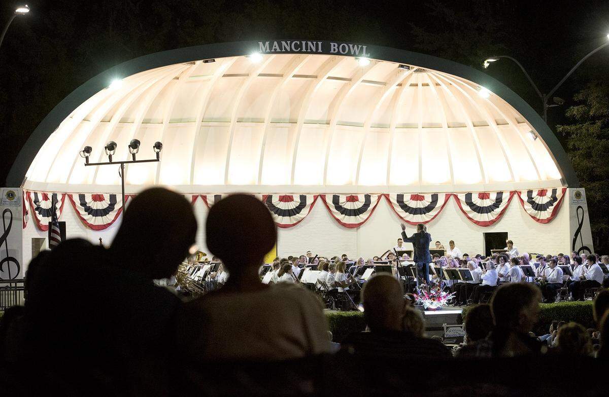 People enjoy a past year’s MoBand at Mancini Bowl in Modesto’s Graceada Park.