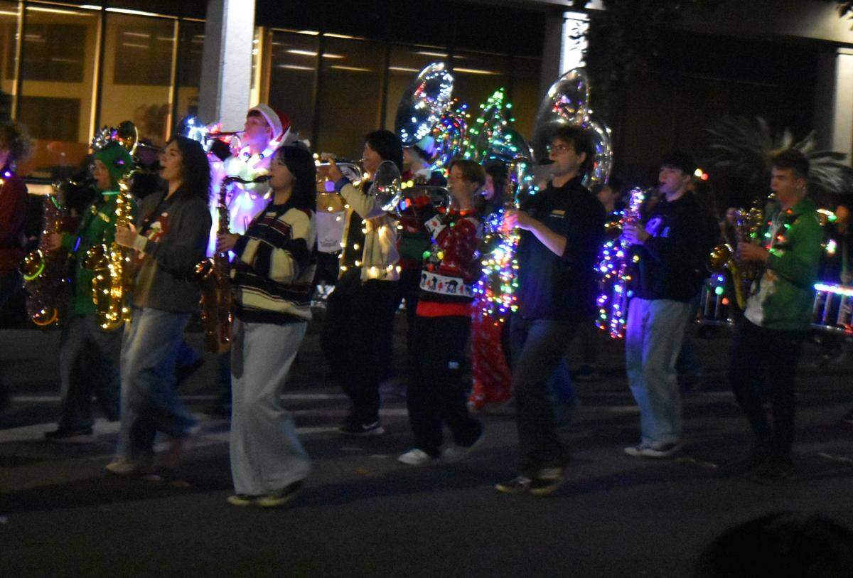 Enochs High’s was among several Modesto high school and middle school bands performing Saturday night, Dec. 7, 2024, in the Celebration of Lights Holiday Parade in downtown Modesto.