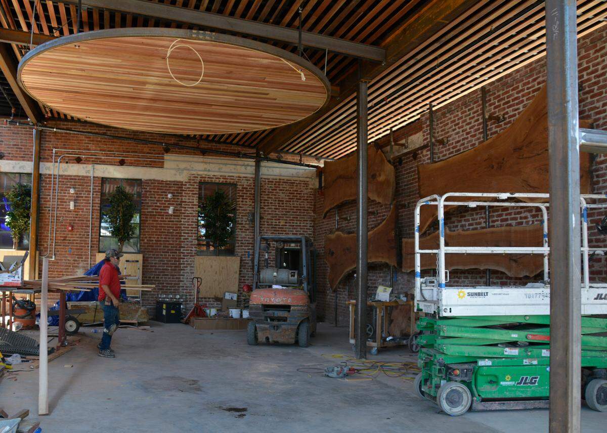 The front courtyard is being transformedinto a large entrance bar of the new Redwood Cafe in Oakdale, Calif. on May 27, 2021.