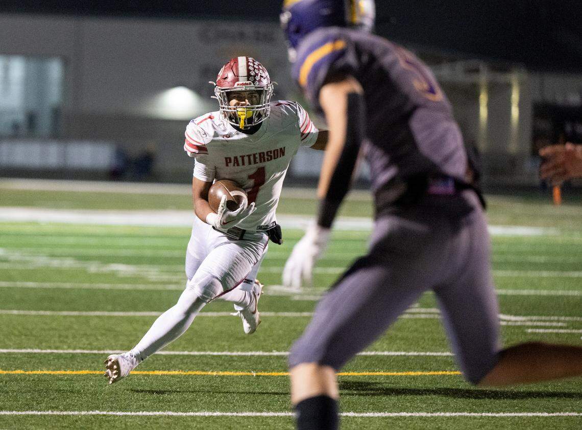 Patterson’s Jeremiah Lugo runs the ball for a touchdown during the Sac-Joaquin Section Division IV championship game with Escalon at St. Mary’s High School in Stockton, Calif., Friday, Nov. 24, 2023.