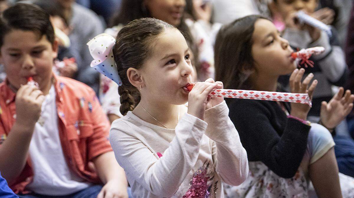 Nola Peitz, 4, middle, and other children ring in the new year with Circus of Smiles during the “Noon” Year’s Eve celebration at the Stanislaus County Library in Modesto, Calif., on Tuesday, Dec. 31, 2019.