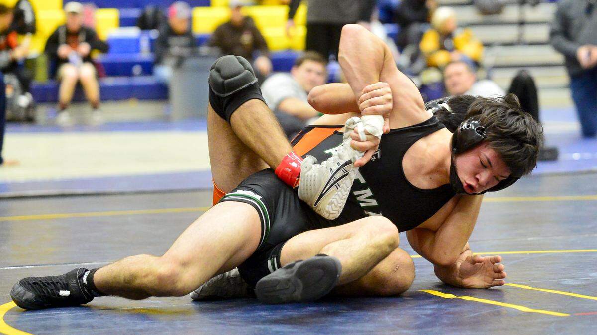 Pitman’s Sammy Silveria works to free him self before winning the 145 championship match during the CIF Sac-Joaquin Section Division II Wrestling Tournament at Gregori High School in Modesto, CA on February 9, 2019.