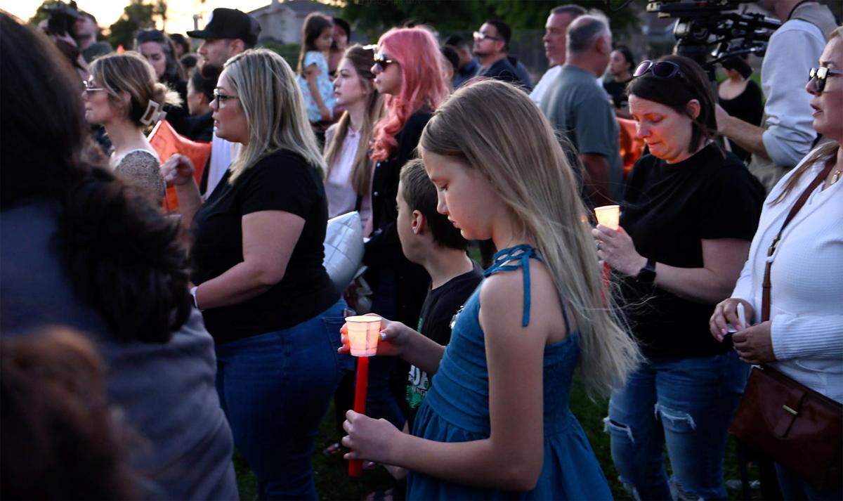 Friends, family members and Hughson residents remember the life and support the family of Dinella Madrigal during a candlelight ceremony in Hughson on  Tuesday, May 6, 2025.