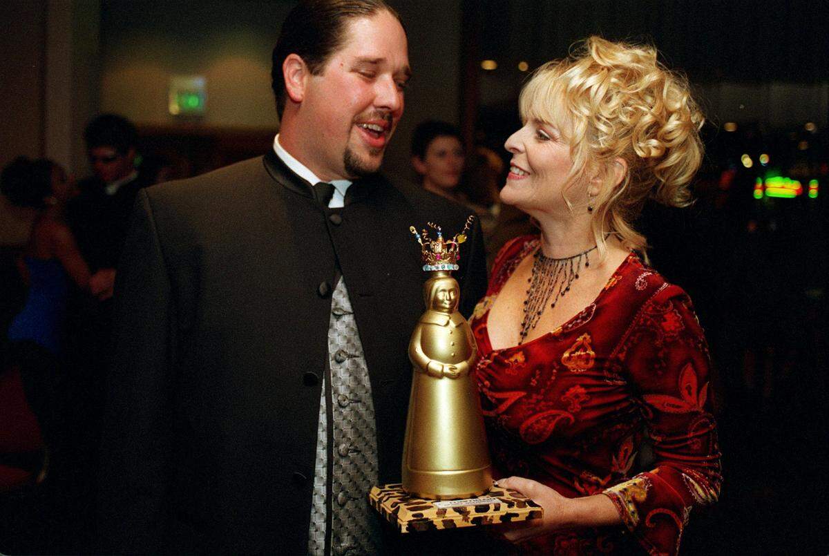 Chris Ricci and Shelly Streeter share a light moment during the Modesto Area Music Awards Thursday at Club Maxx in the Double Tree Hotel in downtown Modesto. Ricci won for X-Fest in the Best Live Event category and Streeter won for Best Country Western Artist.