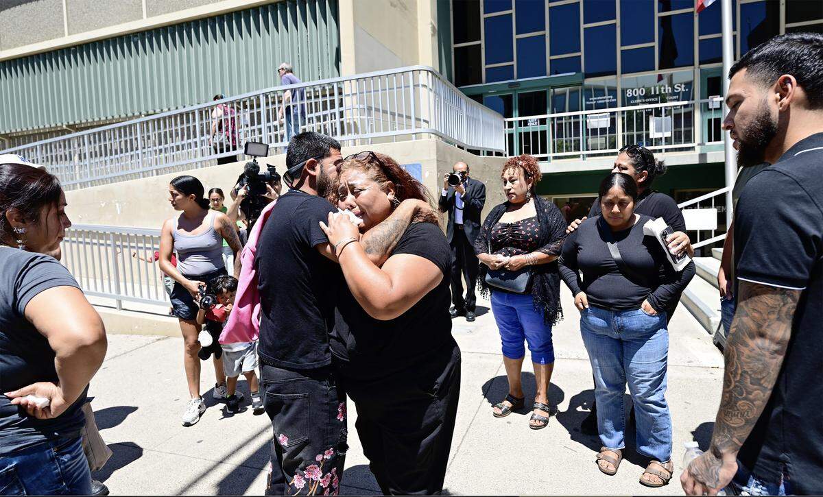 Family of Maria Silvia Nuñez-Villalobos, 23-year-old Fabiola Gonzalez-Nuñez, and 2-week-old Mateo Gonzalez gather after the arraignment of Joaquin Escoto who pleaded not guilty to murder charges in Stanislaus Superior Court in Modesto on Monday June 1, 2026. 