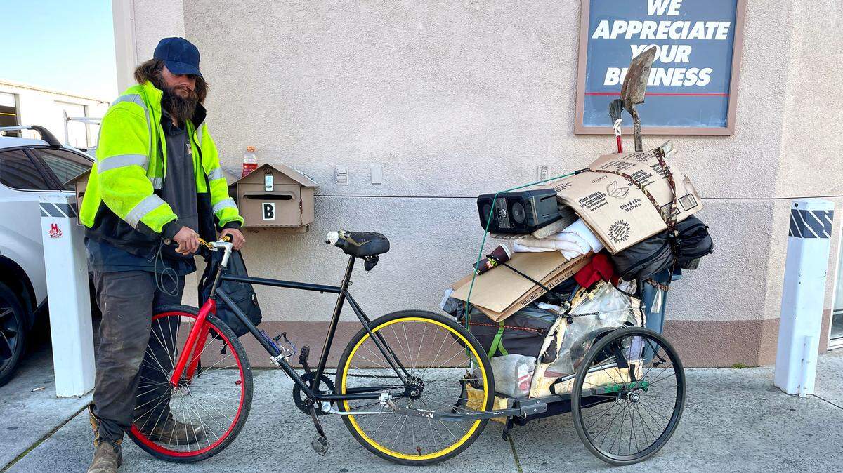 Volunteers surveyed Benjamin Moody along North Carpenter Road during Stanislaus County’s Point-in-Time count of the homeless population in Modesto, Calif., Thursday, Jan. 26, 2023.