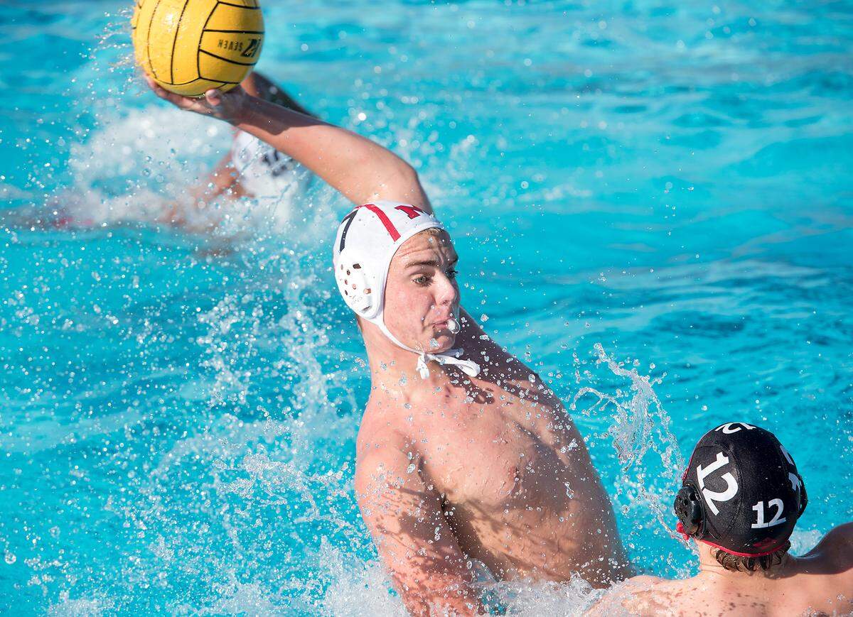 Modesto High’s Robbie DeMont attempts a shot on goal during the DeLong Water Polo Tournament game with Mt. View of Oregon at Enochs High School in Modesto, Ca., on Friday, Oct. 19, 2018.