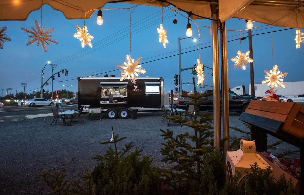 East Meats West Asian and American food truck outside Rodin Farm fruit stand on Oakdale Road in Modesto, Calif., Dec. 2, 2021.