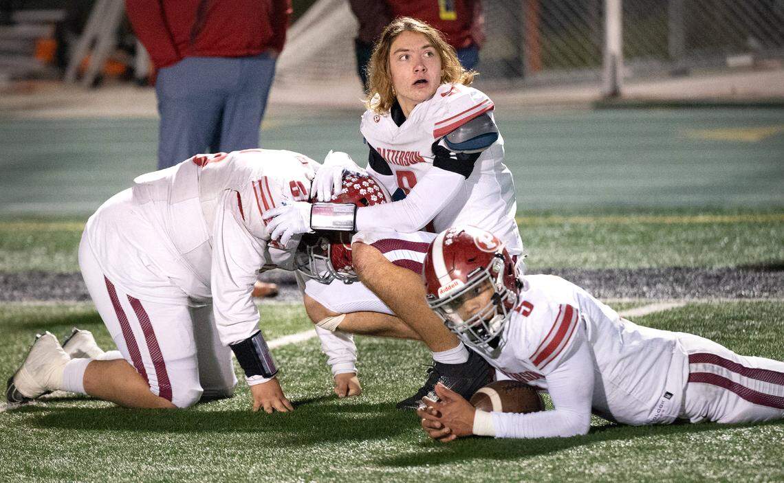 Patterson players react after their final play came up short of the end zone in the Sac-Joaquin Section Division IV championship game with Escalon at St. Mary’s High School in Stockton, Calif., Friday, Nov. 24, 2023. Escalon won the game 36-35.