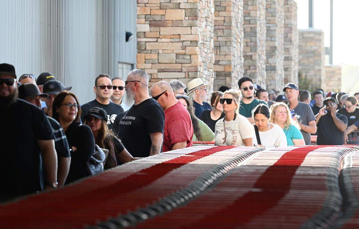 A large crowd of Costco members lines up for the grand opening of the new warehouse store in Riverbank, Calif., Thursday, June 13, 2024.
