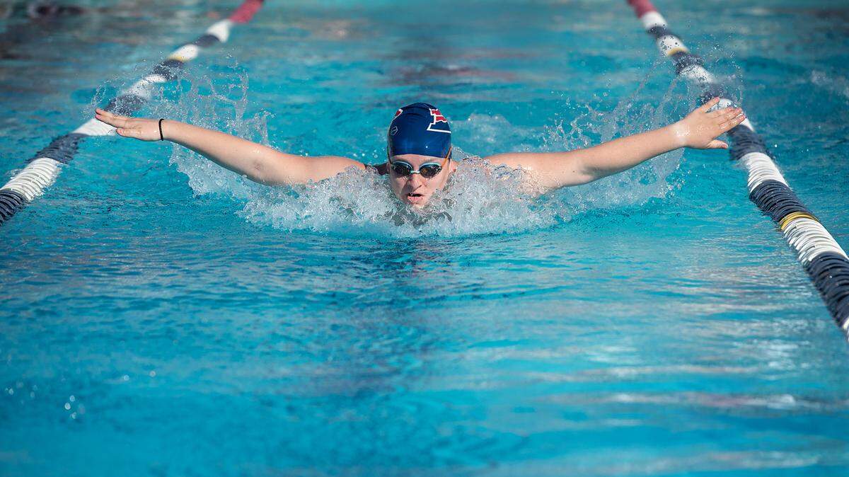 Beyer varsity swimmer Baylee Leonetti swims the butterfly leg in the 200 meter relay during the meet with Lathrop High at Beyer High School in Modesto, Calif., on Friday, March 12, 2021.