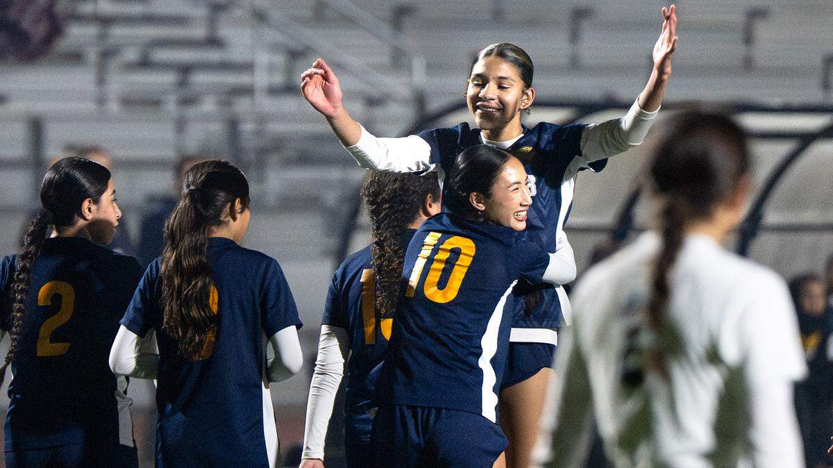 Gregori’s Grace Rodriguez (10) is greeted by teammate Kylie Farmer after scoring a goal during the Central California Athletic League game with Pitman at Gregori High School in Modesto, Tuesday, Jan. 13, 2026.