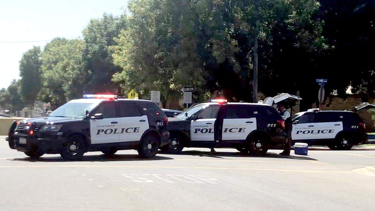 Turlock police are pictured on Canal and Berkeley in Turlock, Calif. on September 10, 2019.