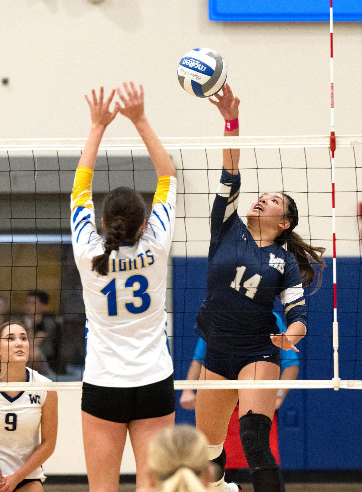Ripon Christian’s Alanna Blanco (13) challenges the shot Central Catholic’s Czyleah Pabustan (14) during the Sac-Joaquin Section Division III quarterfinal playoff match at Ripon Christian High School in Ripon, Thursday, Oct. 31, 2024.