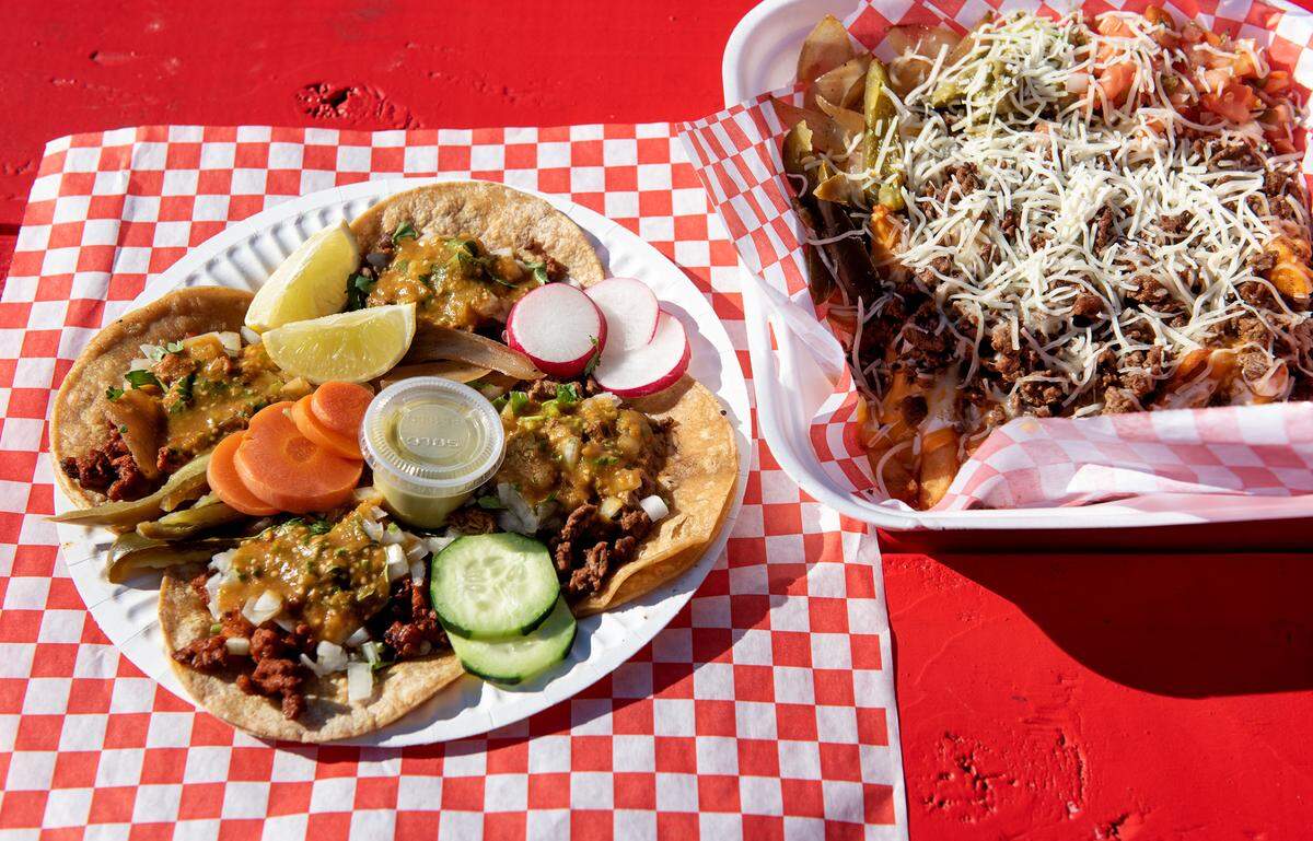 Tacos and loaded fries from Ricky’s Tacos in Modesto, Calif., Tuesday, Dec. 13, 2022.