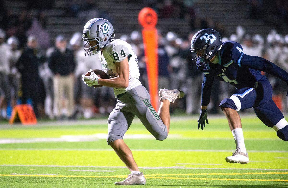 Granite Bay’s Joseph Cattolico makes a touchdown catch during the CIF Sac-Joaquin Section Division II playoff game with Downey at Downey High School in Modesto, Calif., Friday, Nov.11, 2022.