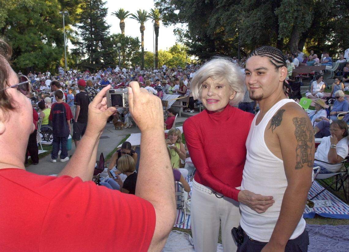 Carol Channing poses for a photo with Noe Estrada of Modesto prior to the Modesto Band concert at Graceada Park in Modesto, Calif. on Thursday July, 15, 2004.
