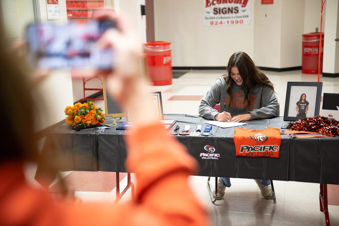 Adriana Dorn has signed to play volleyball at the University of the Pacific in Stockton. Family, coaches and friends attended a signing party at Ripon High School in Ripon, Thursday, Nov. 13, 2025. 