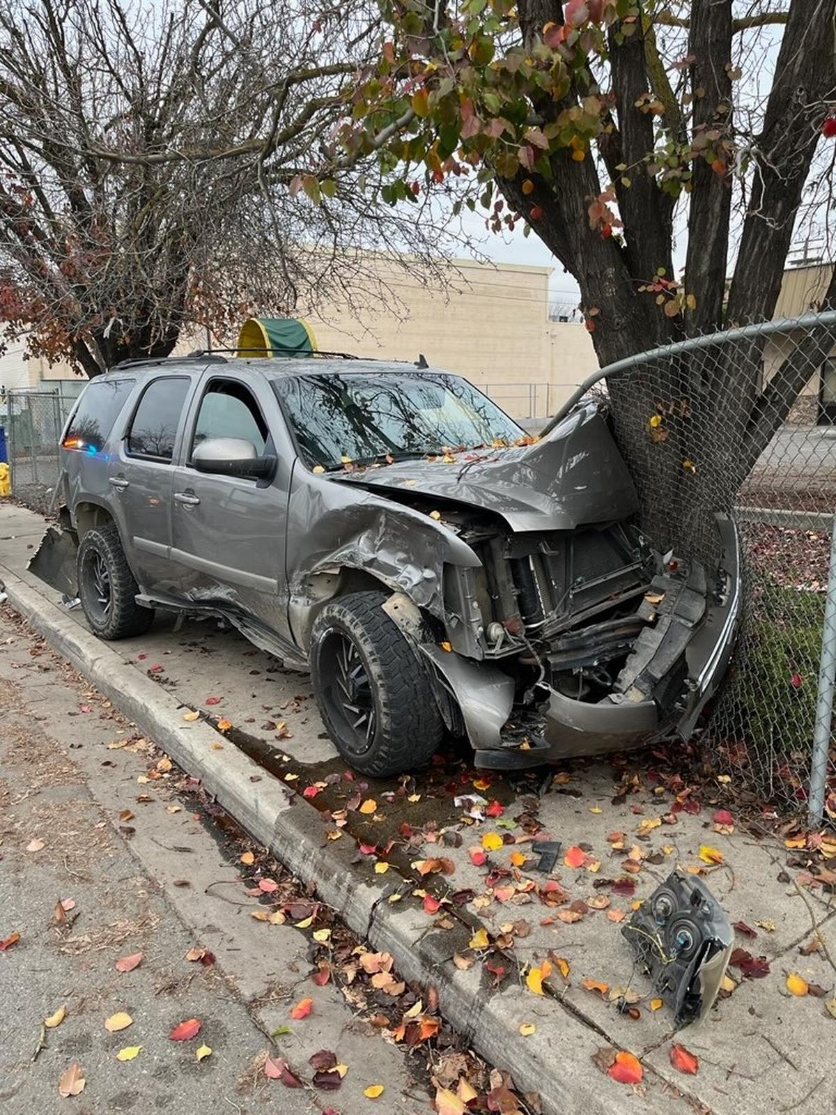 A vehicle reported to be stolen crashed into a fence following a pursuit through Modesto on Tuesday, Dec. 26, 2023.